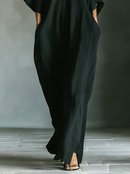 Alejandra | Vestido largo negro oversize minimalista con mangas kimono